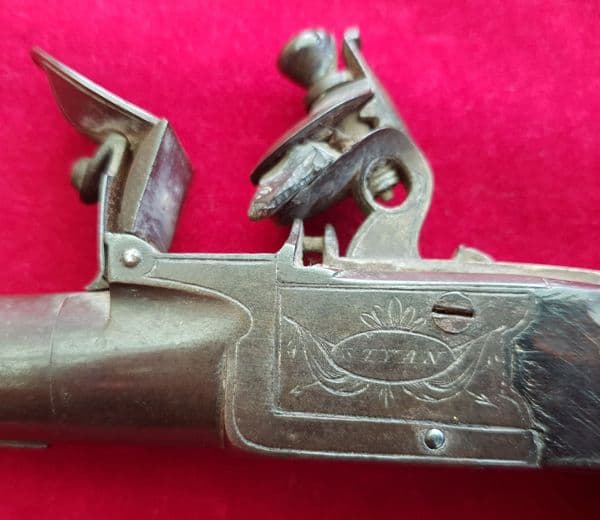 A flintlock pocket pistol with folding trigger by STYAN of Manchester. Circa 1803-1811.  Ref 2139.